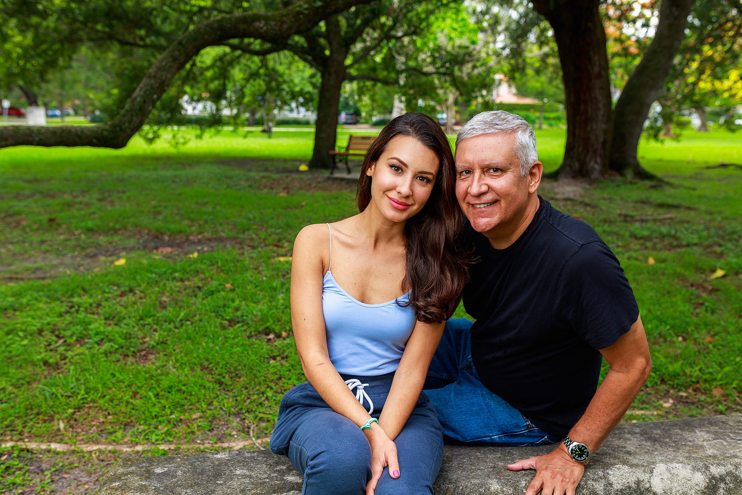 Father,And,Daughter,Outdoor,Portrait,In,A,Park,Setting. Father and daughter outdoor portrait in the New Forest