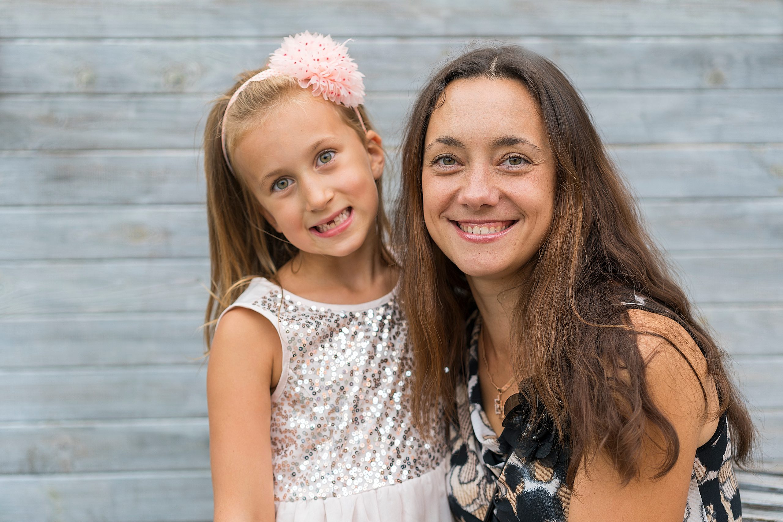Beautiful,Mother,With,A,Little,Beautiful,Daughter Portrait of mother with daughter