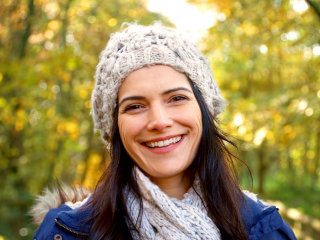 Head,And,Shoulders,Portrait,Of,Smiling,Woman,Wearing,Hat,And